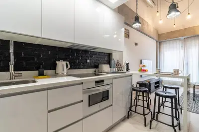 Una cocina o zona de cocina en Apartamentos Marina Suites