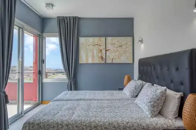 Cama o camas de una habitación en Sea View Villa Vista Golf