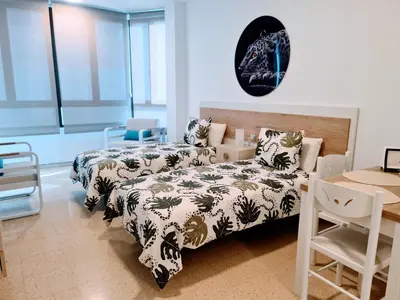 Cama o camas de una habitación en VV Canteras Beach Paradise 