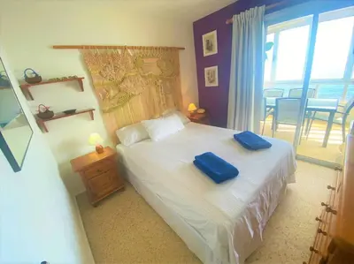 Cama o camas de una habitación en Salinetas, frente al mar y playa