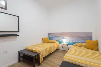 Cama o camas de una habitación en Melenara Beach - Cozy Ground-Floor Flat
