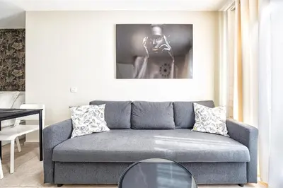 Zona de estar de City and Beach Home, Las Canteras