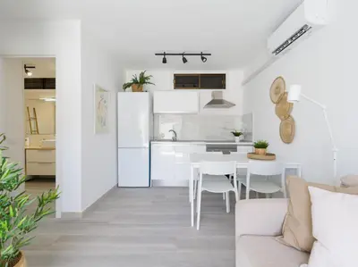 Una cocina o zona de cocina en Cumana Suites Puerto Rico