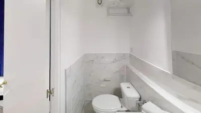 Un baño de VV Las Buganvillas MASPALOMAS - Cocina y habitaciones con baños privados