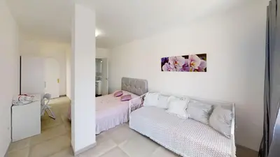 Cama o camas de una habitación en VV Las Buganvillas MASPALOMAS - Cocina y habitaciones con baños privados