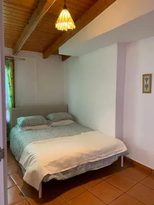 Cama o camas de una habitación en El Alpendre De la Vega