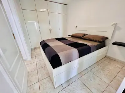 Cama o camas de una habitación en Matahari. Amadores Apartment