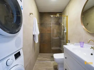 Un baño de Living Las Canteras Homes- VIEW POINT