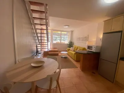 Una cocina o zona de cocina en Modern Duplex apartment near swimming pool