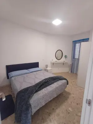 Cama o camas de una habitación en La Marea Azul