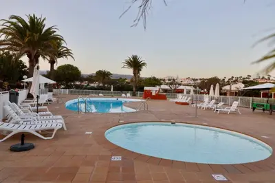Piscina en o cerca de Bungalow Los Melocotones in Maspalomas - Playa del Ingles