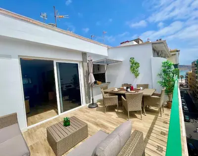 Un balcón o terraza de Sunrise Terrace Apartment