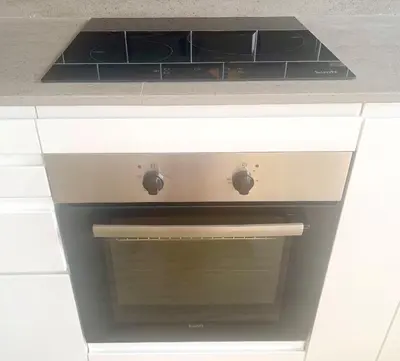 Una cocina o zona de cocina en Sunrise Terrace Apartment
