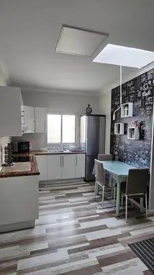 Una cocina o zona de cocina en Apartamentos GARAKOTA