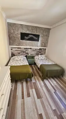 Cama o camas de una habitación en Apartamentos GARAKOTA