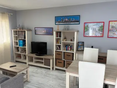 Una televisión o centro de entretenimiento en Casa Nueva