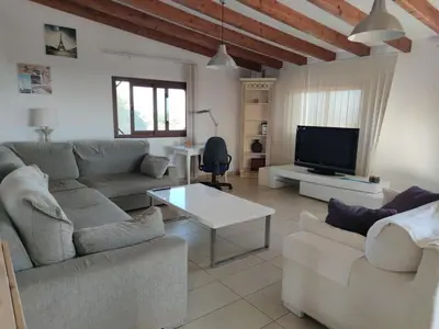 Zona de estar de Sunset and oceanview 1 bedroom apartment with shared pool
