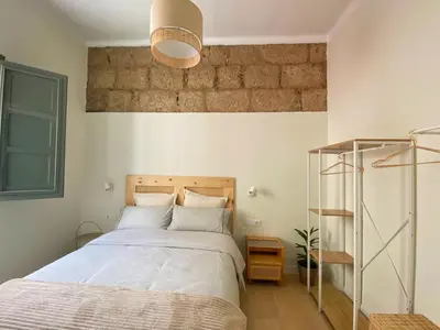 Cama o camas de una habitación en La Puebla Rooms