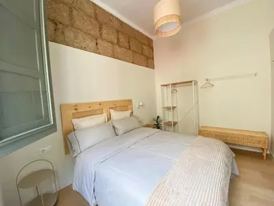 Cama o camas de una habitación en La Puebla Rooms