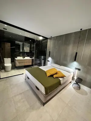Cama o camas de una habitación en Mirador Suites