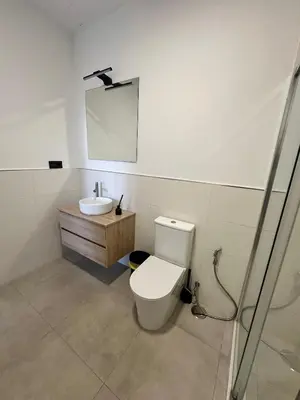 Un baño de Mirador Suites