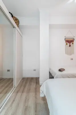 Cama o camas de una habitación en Home2Book Charming Design Apt Las Canteras Beach