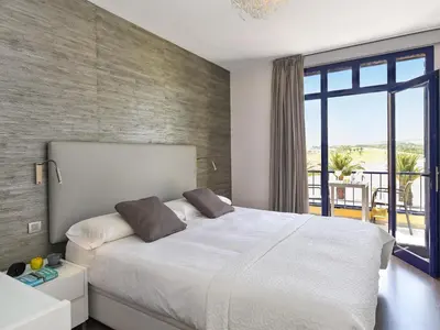 Cama o camas de una habitación en Belvilla by OYO Meloneras Bahia 7