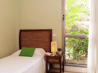 Cama o camas de una habitación en Belvilla by OYO Vibrant Villa with Swimming Pool