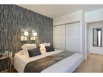 Cama o camas de una habitación en Belvilla by Oyo Apartment Aida 202
