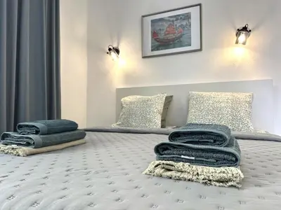 Cama o camas de una habitación en Las Dunas DM sea view
