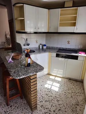 Una cocina o zona de cocina en Apartamentos Viviendas vacacionales Isabel Maria