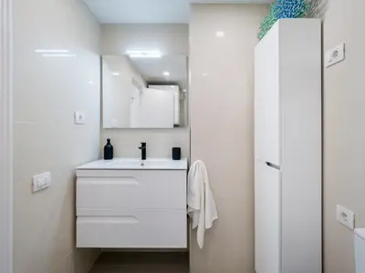 Un baño de Apartamento Primera línea playa