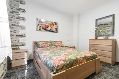 Cama o camas de una habitación en Raíces Vivas Vivienda Vacacional