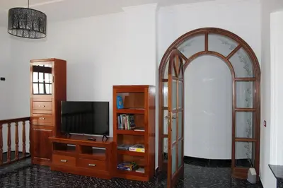 Una televisión o centro de entretenimiento en Casita Lily
