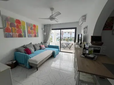 Zona de estar de Vacaciones al sol San Agustin con piscina y WIFI
