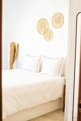 Cama o camas de una habitación en La Petite-home near AirPort-wifi-garage-elevator-homely