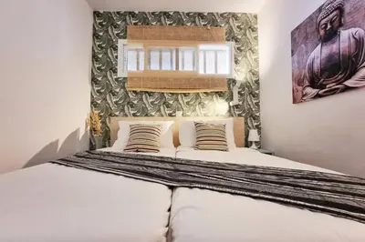 Cama o camas de una habitación en Stylish bungalow with sea views