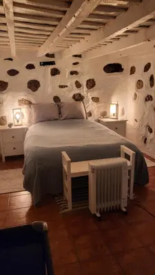 Cama o camas de una habitación en Casa Rural LOS PINARES El Juncal de TEJEDA
