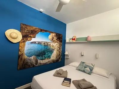 Cama o camas de una habitación en Loris Home playa ingles 50mt from Yumbo by luca properties gran canaria