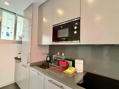 Una cocina o zona de cocina en Loris Home playa ingles 50mt from Yumbo by luca properties gran canaria