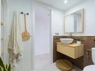 Un baño de Apartamento Primera Línea de Playa