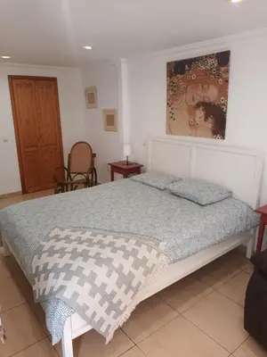 Cama o camas de una habitación en As de guía, playa de las canteras Vv