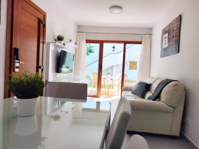 Zona de estar de Los Balandros 104 with terrace by SunHousesCanarias