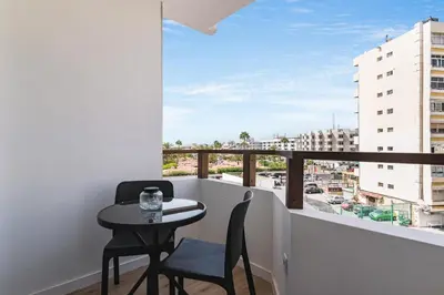 Un balcón o terraza de Home2Book Stylish Apartment Playa del Inglés