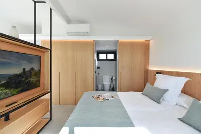 Cama o camas de una habitación en Los Canarios 629 by VillaGranCanaria