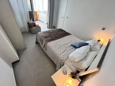 Cama o camas de una habitación en Canteras, La Puntilla, Casa de playa sobre el mar