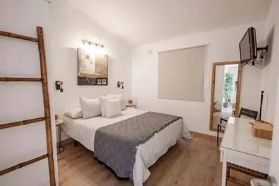 Cama o camas de una habitación en Deluxe Los Porches - by Gestión Vacacional Canarias