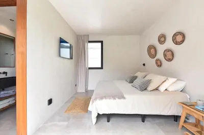 Cama o camas de una habitación en Alma Tauro by VillaGranCanaria