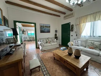 Una televisión o centro de entretenimiento en Villa La Finca