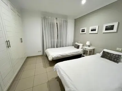 Cama o camas de una habitación en COSTA AZUL APARTMENTS - 2B